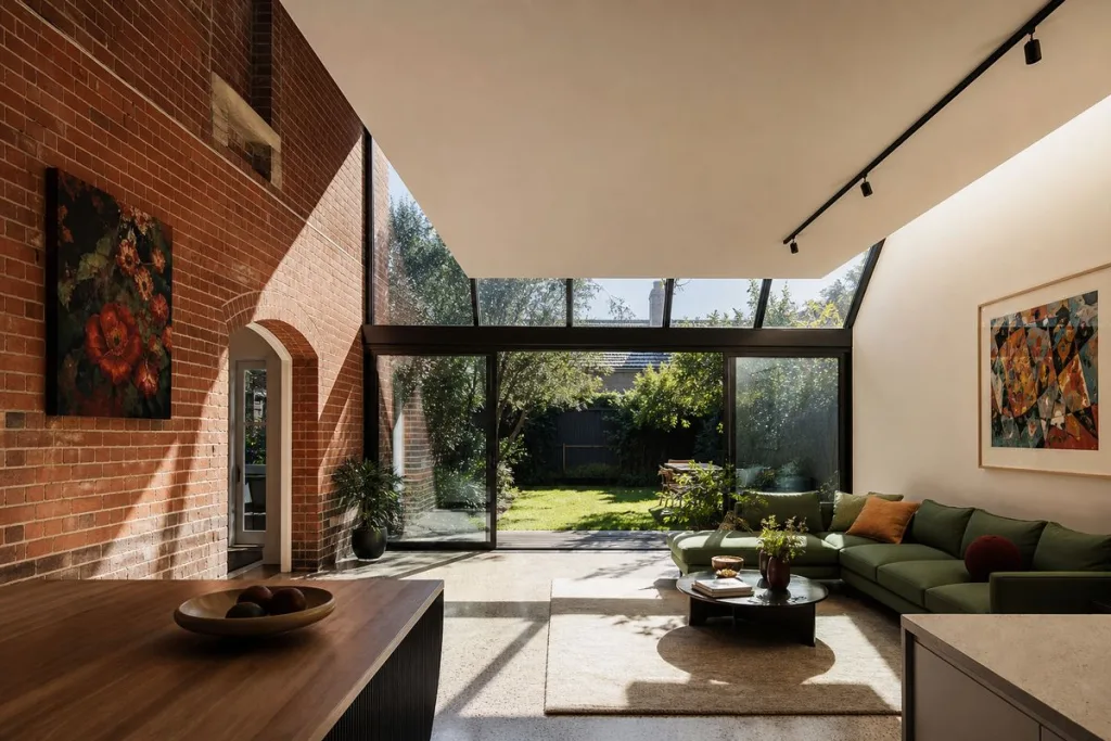 Rear extension on a Melbourne period home where original brickwork meets a modern glazed living space