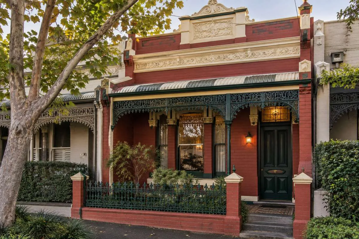 Melbourne Victorian terrace with authentic heritage colour scheme in red, cream and green