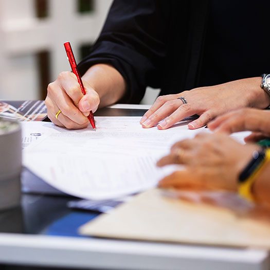 People signing contract